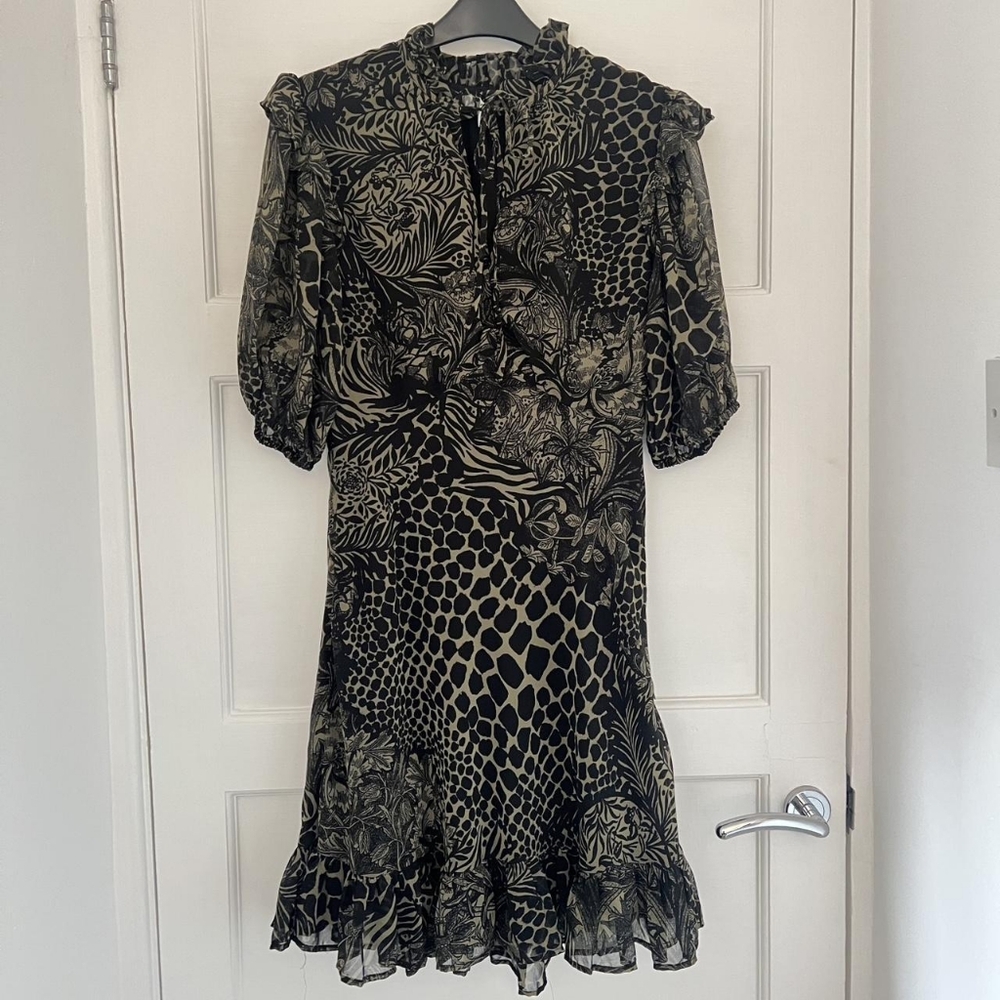 Elegant Black and Cream Patterned Dress